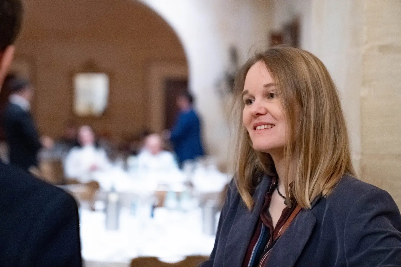 A participant in conversation during the ceremony