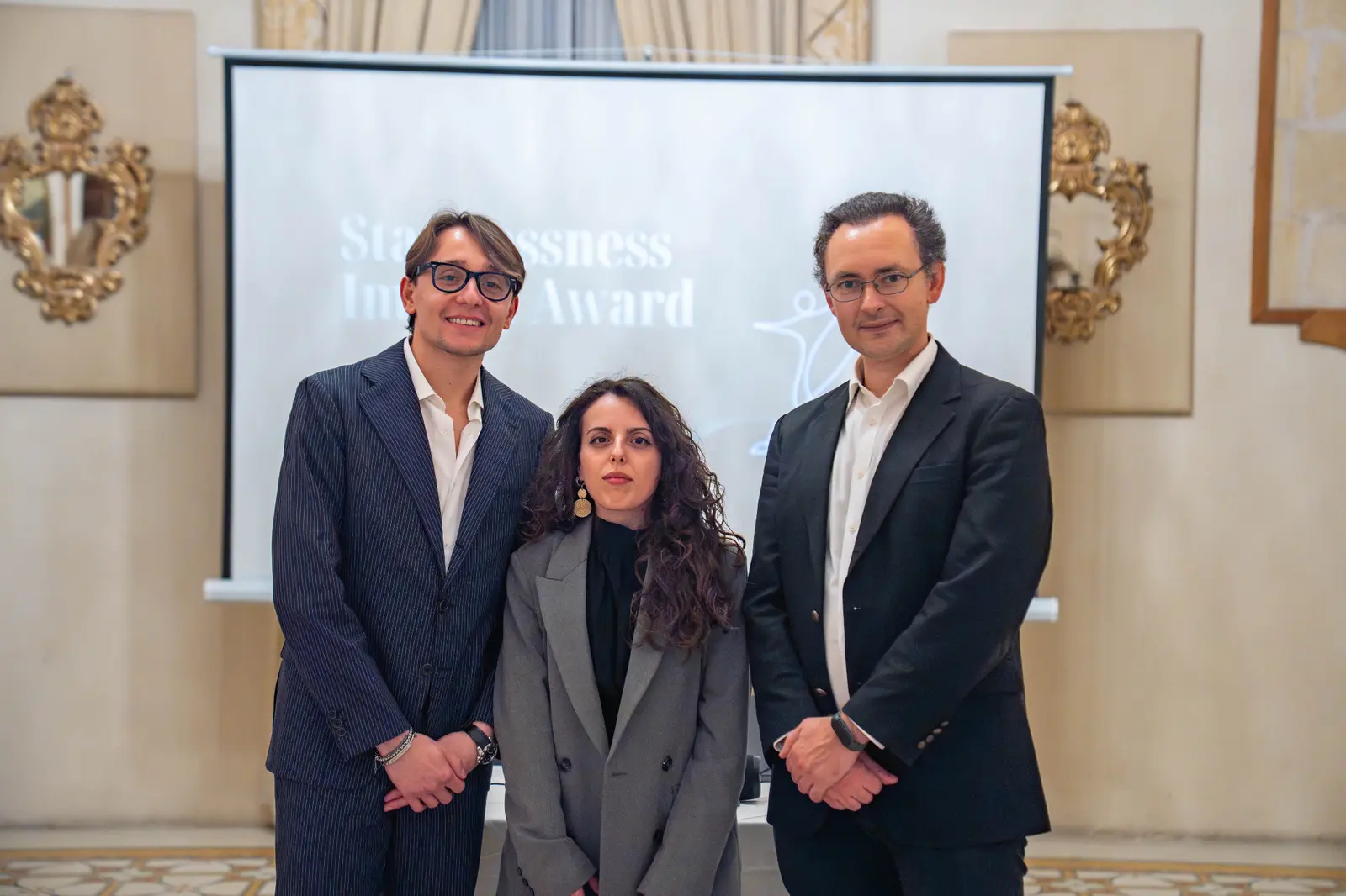 Three participants at the inaugural award ceremony